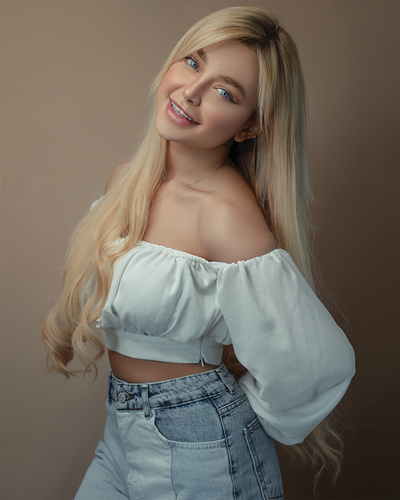 Teenage Girl in White Crop Top Smiling